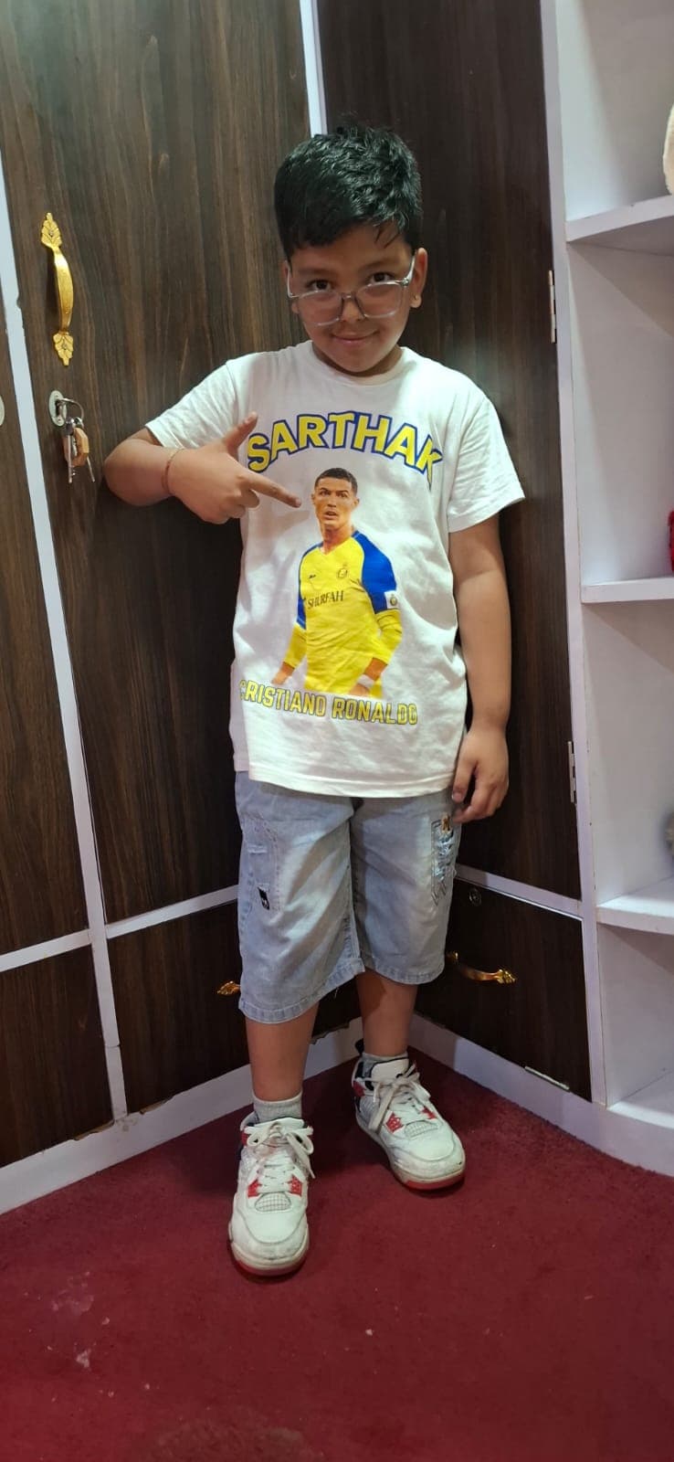 Sarthak wearing a custom Cristiano Ronaldo name T-shirt from TOTOPASA